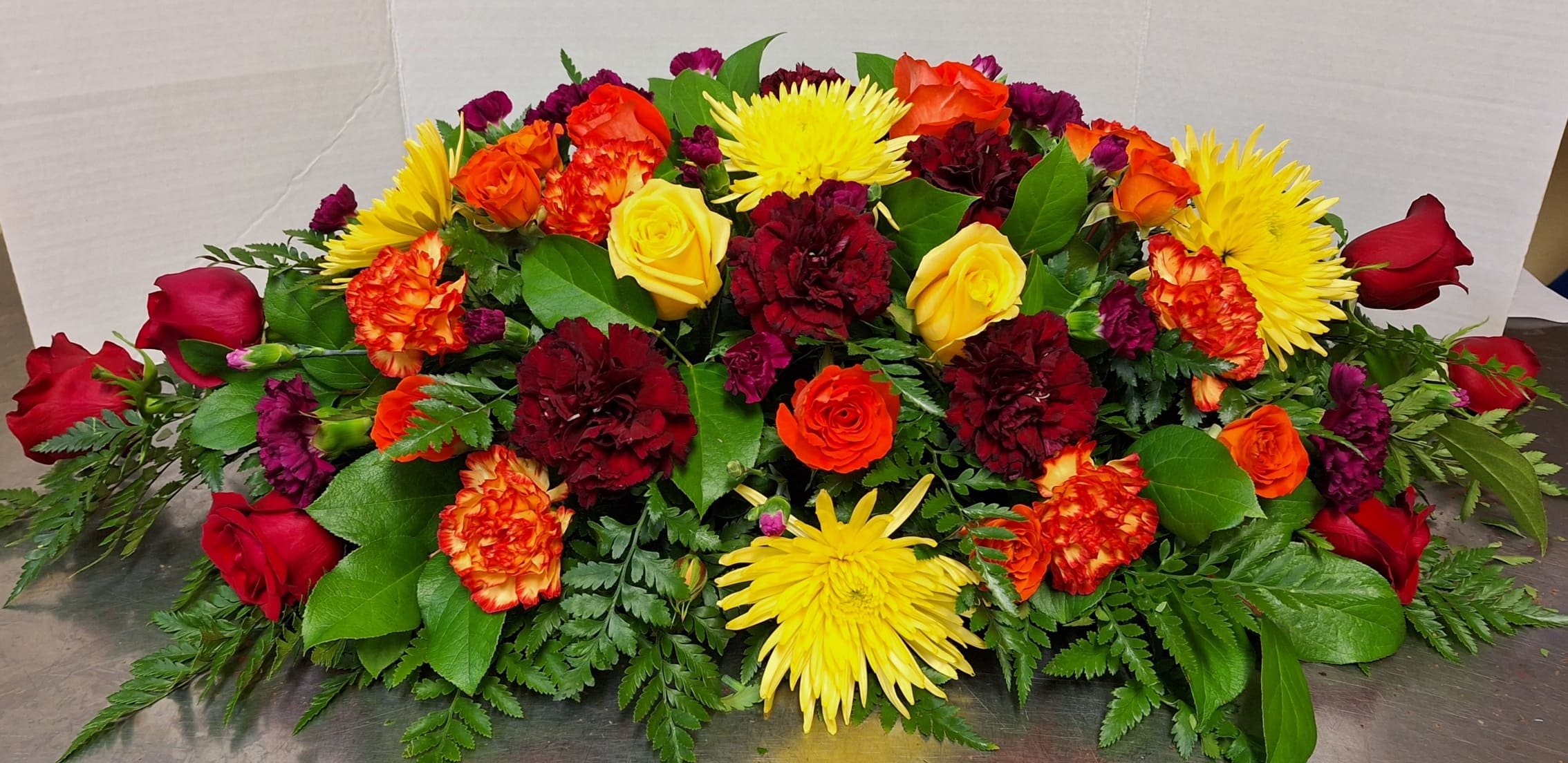 "Autumn Skies" Casket Spray