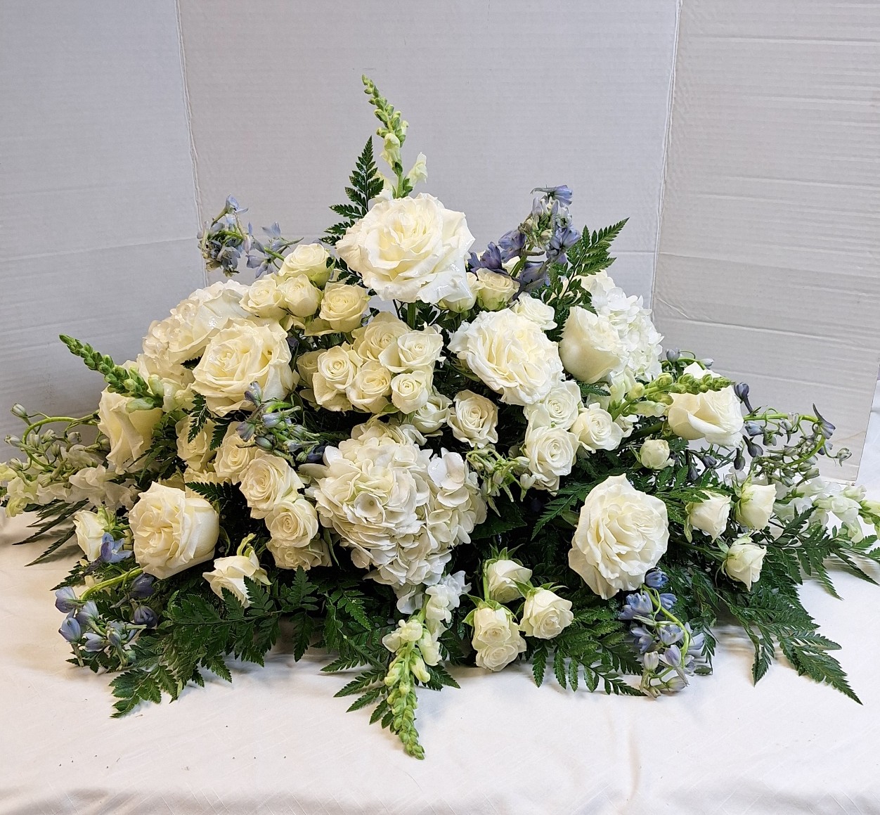 "Peaceful White" Casket Spray
